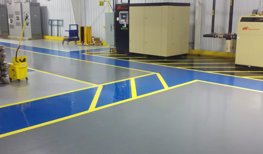 warehouse-resinous-floor-coatings-epoxy-floor-coatings-resinous-floor-coatings-line-striping-by-liquid-floors-scaled